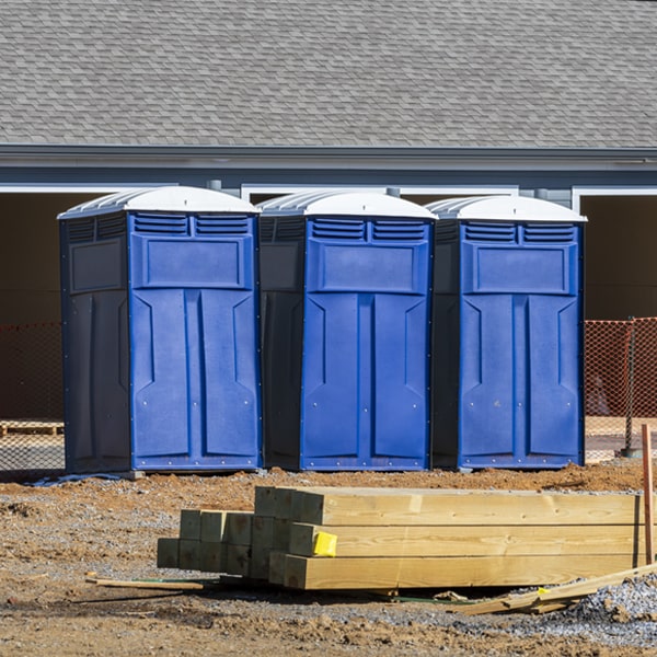 what is the cost difference between standard and deluxe portable toilet rentals in Denver Indiana